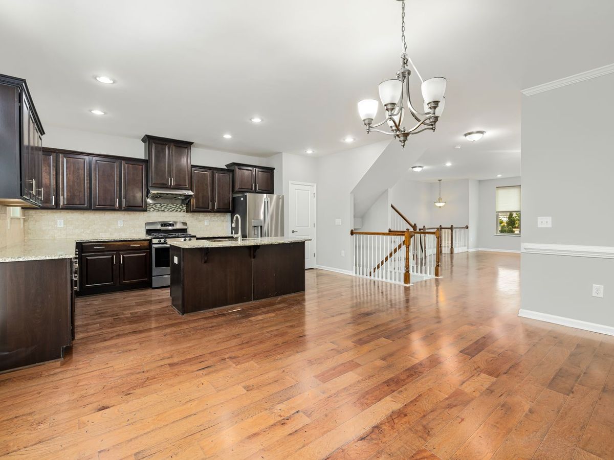 An open kitchen and living room with no wall between them