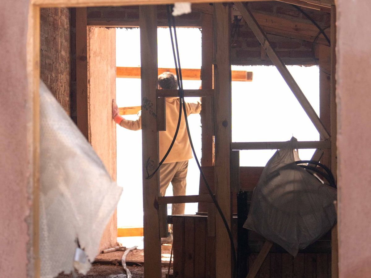 An interior wall opened up down to the studs